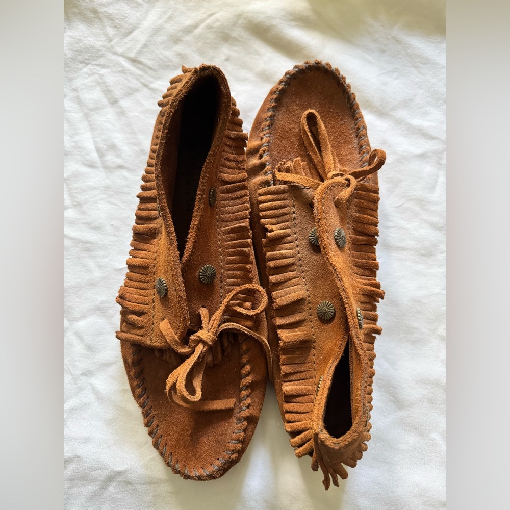 Minnetonka Tan Moccasins with Fringe and Button Accents